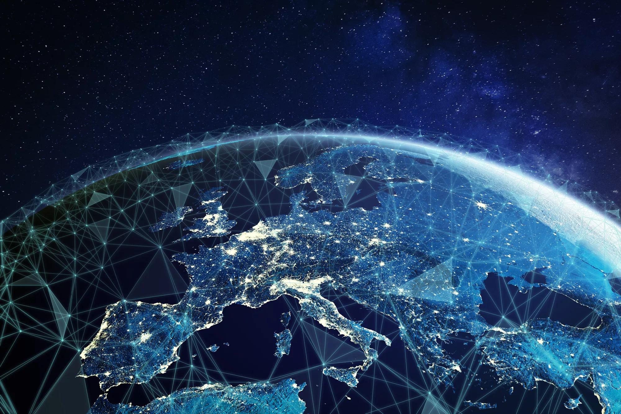 Telecommunication network above Europe viewed from space with connected system for European 5g LTE mobile web, global WiFi connection, Internet of Things (IoT) technology or blockchain fintech