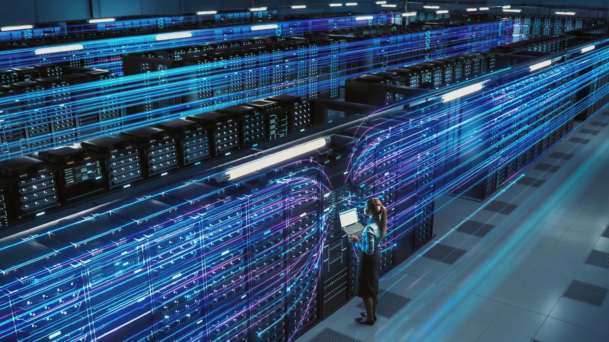 Modern data center with rows of servers supporting cloud security services and secure data storage infrastructure.