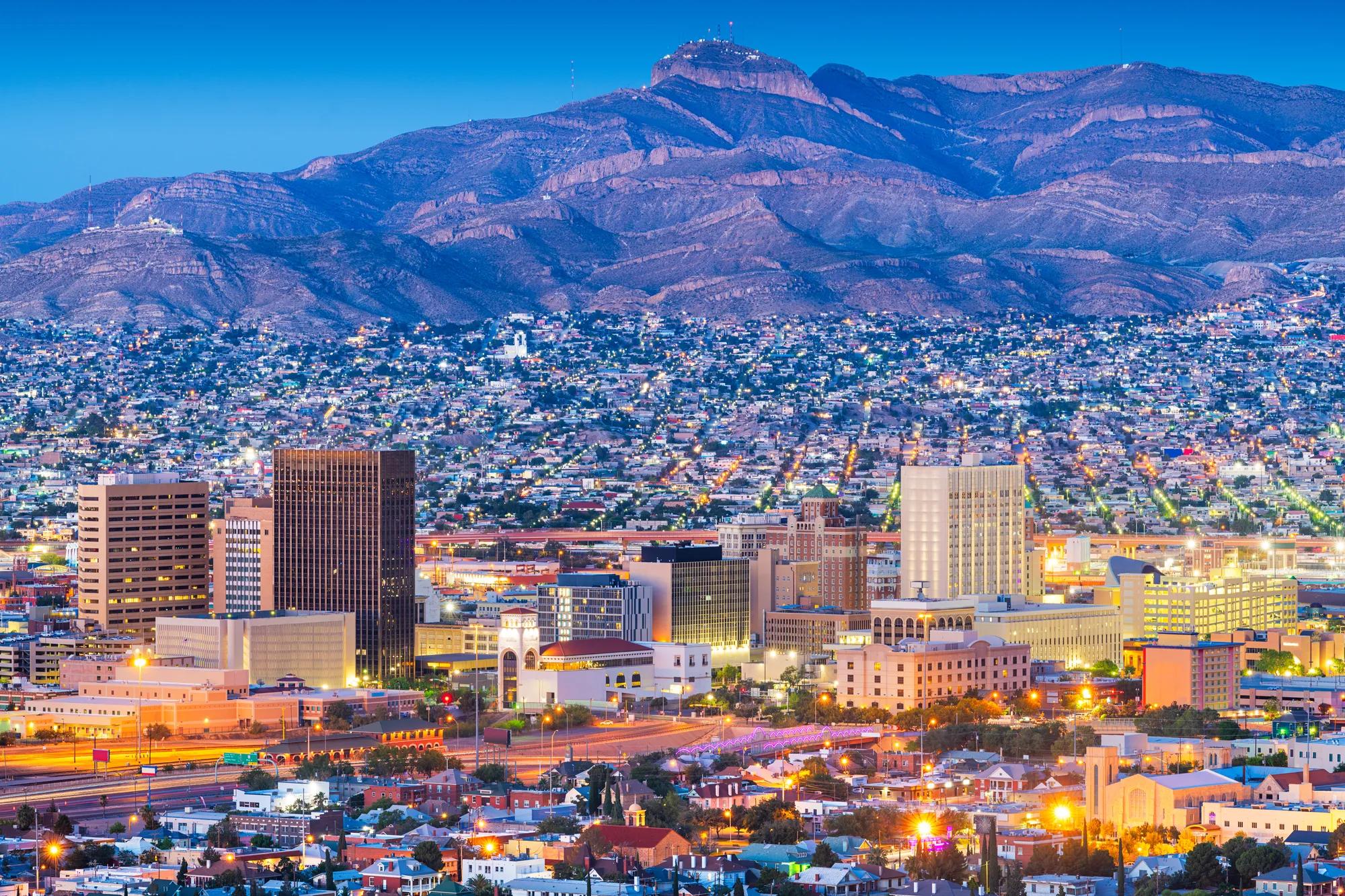 El Paso, Texas, USA  downtown city skyline at dusk with Juarez, Mexico in the distance.