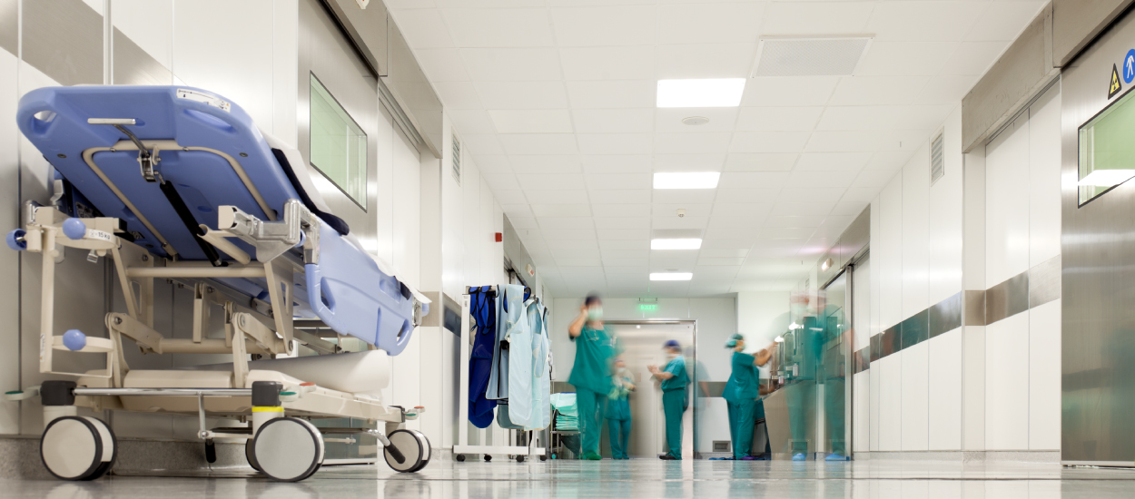 Hospital hallway with staff moving about