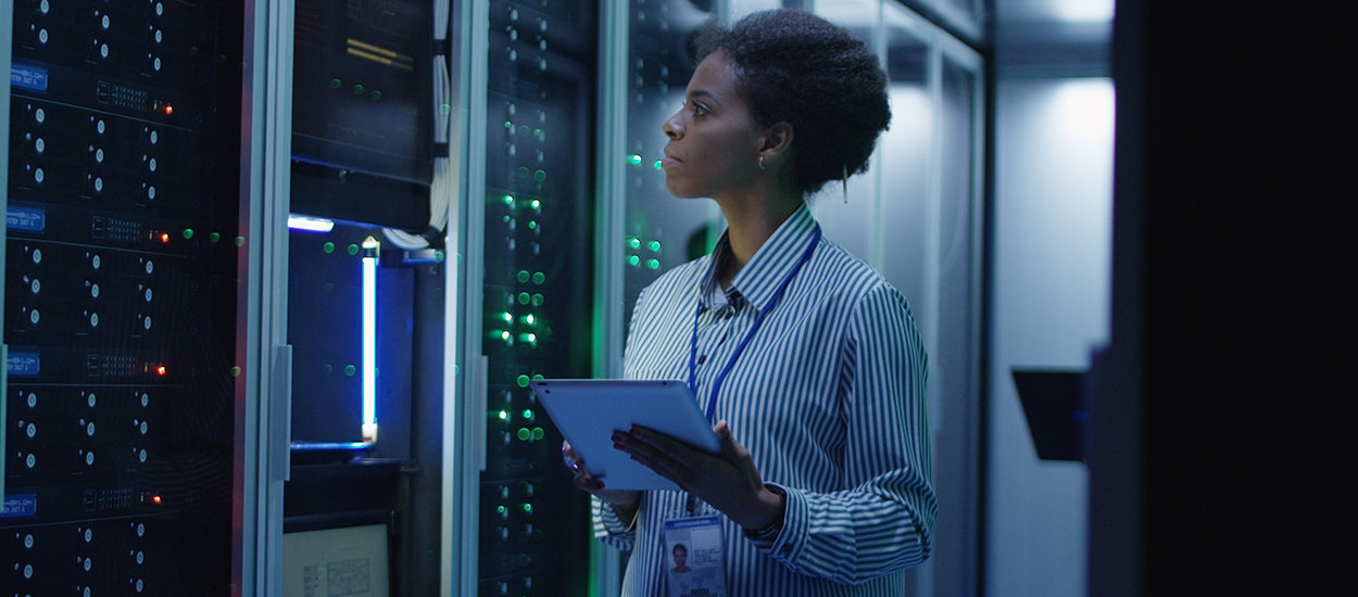 Woman inspects servers