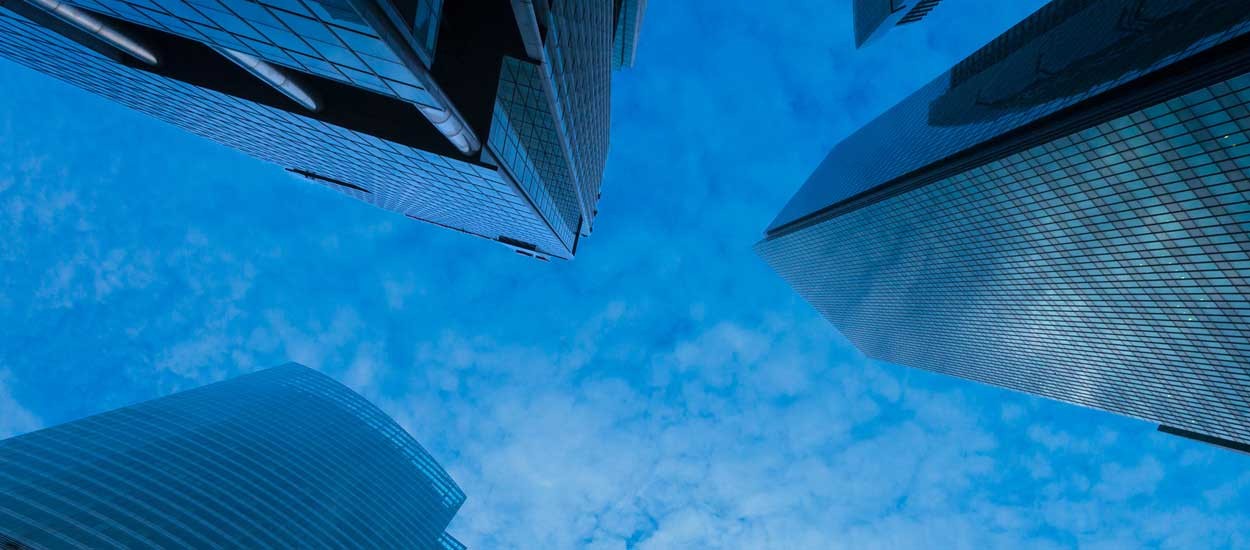 View of sky between skyscraper buildings