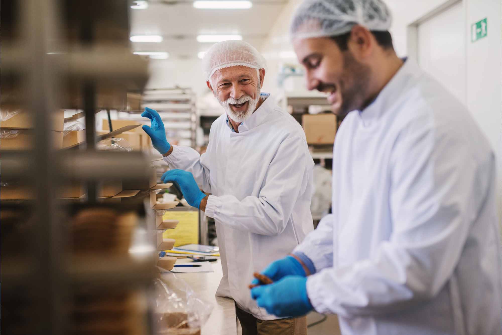 Employees with gloves and hairnets