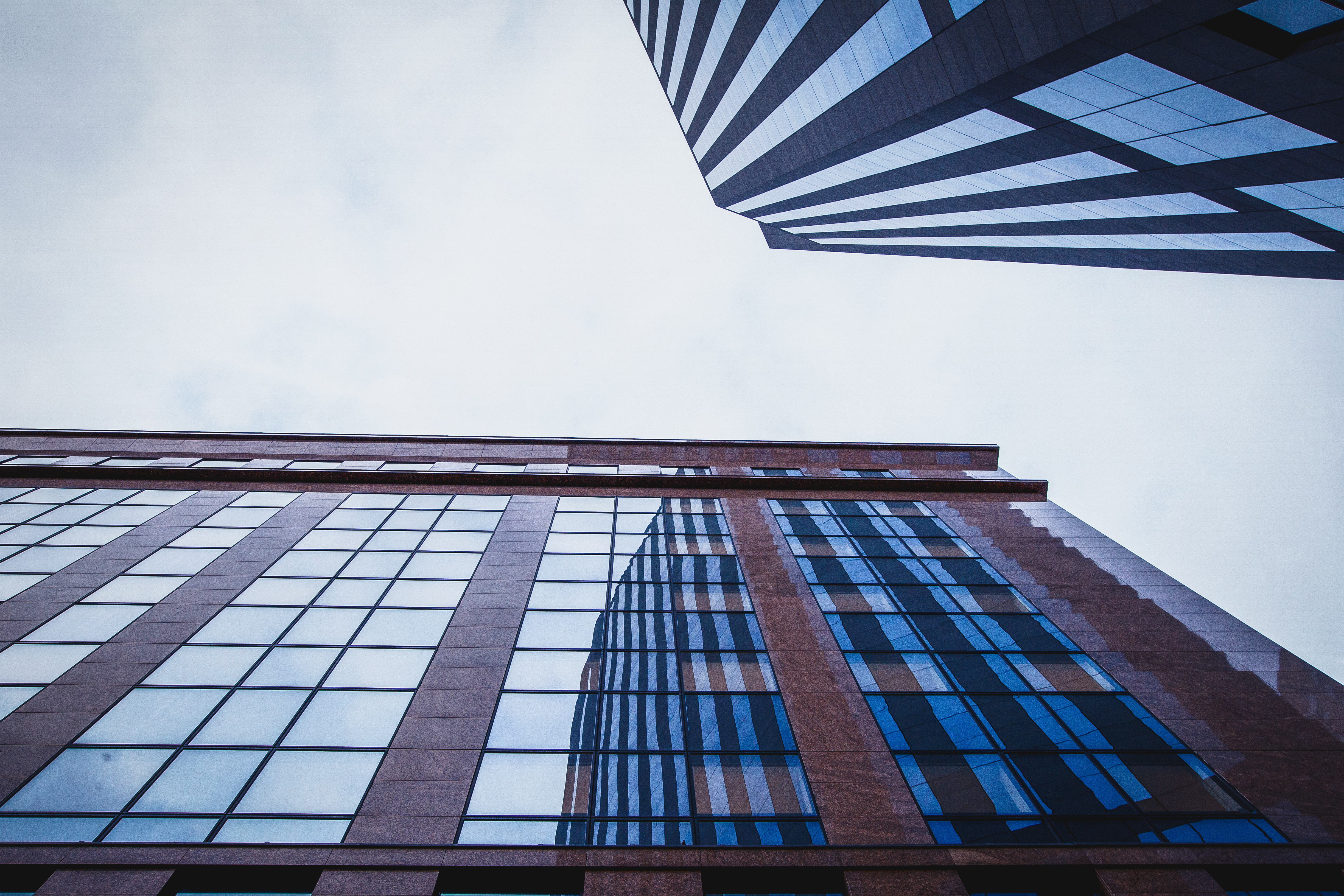 Buildings outside looking up toward sky