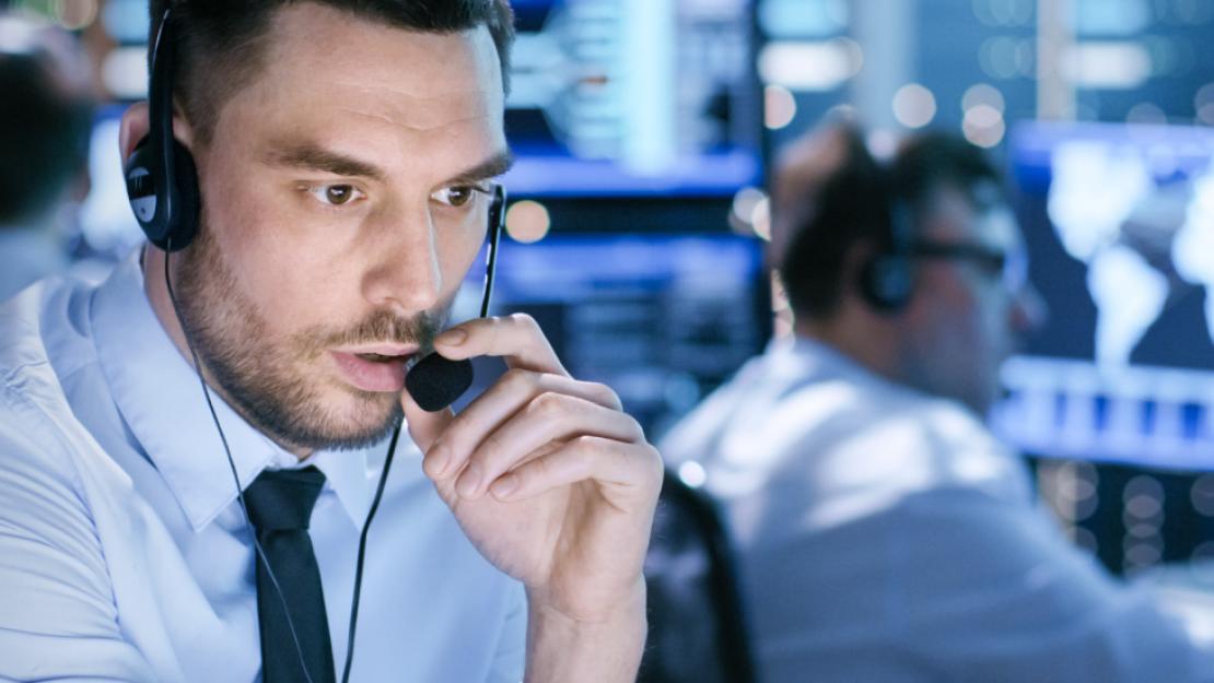 security monitoring center representative responding to call