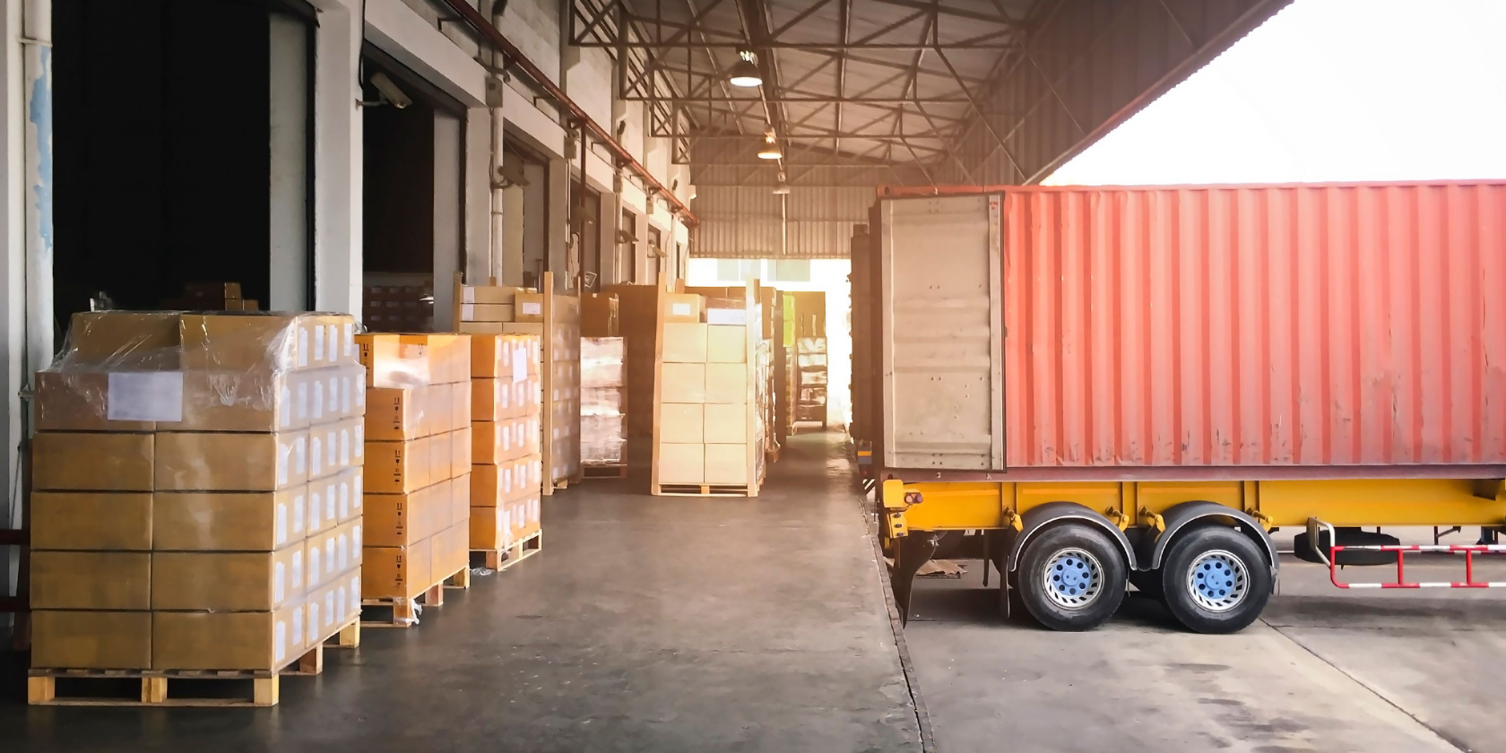 Trailer Truck Parked Loading Package Boxes at Dock Warehouse