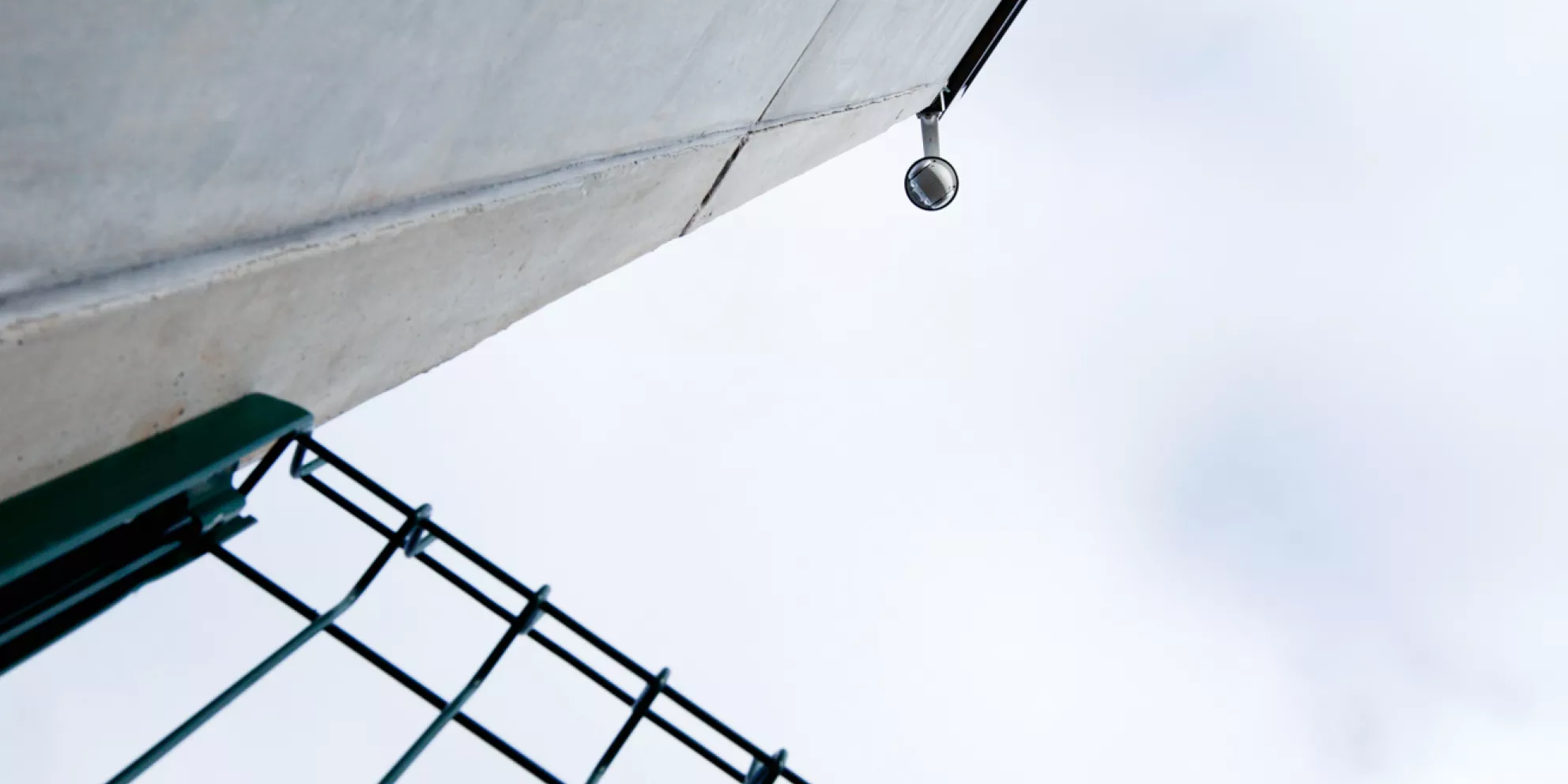 Camera mounted on concrete wall
