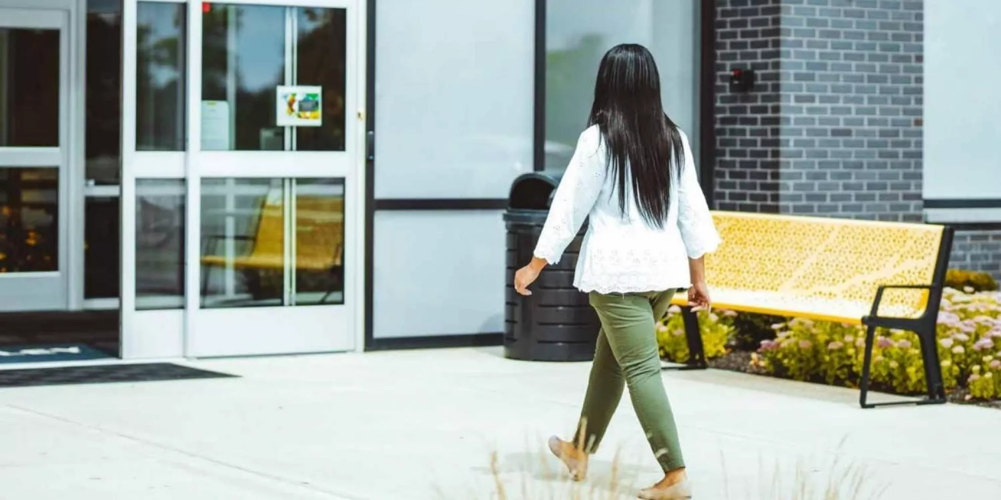 Woman entering through door access control system 