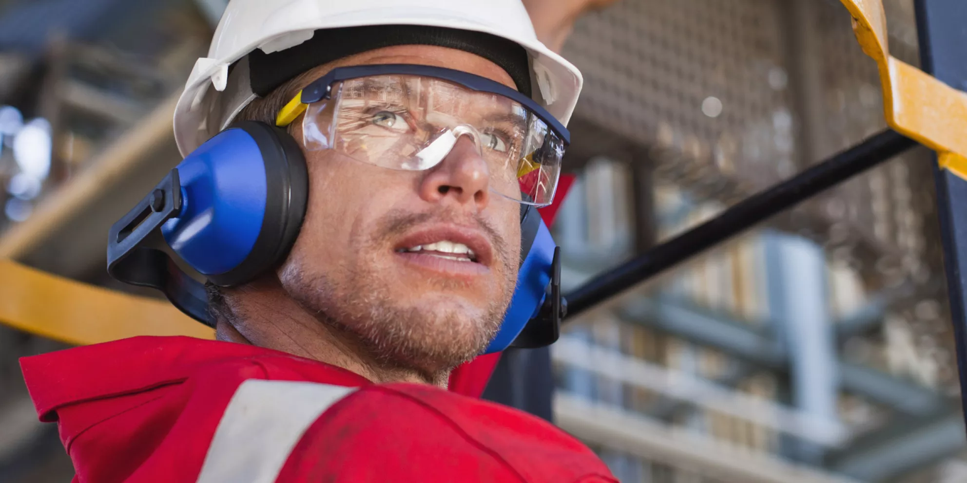 Construction worker climbing stairs