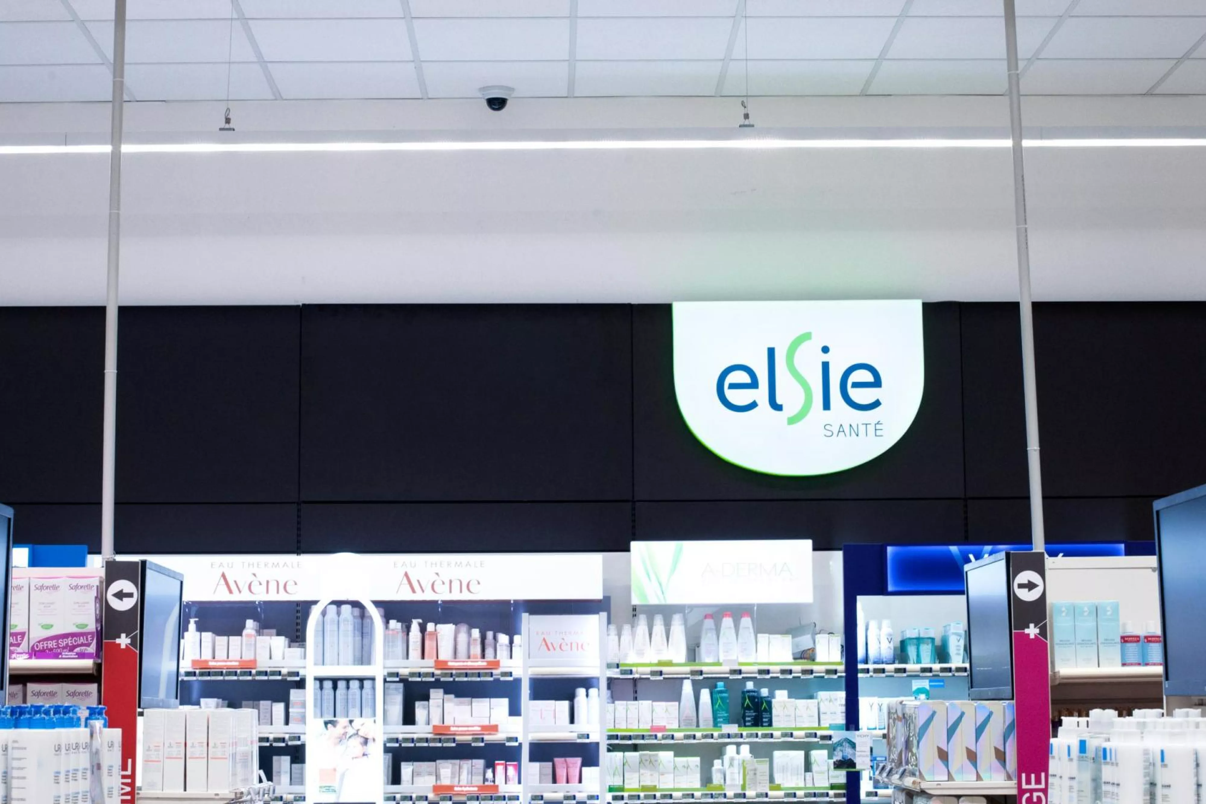 Security camera above pharmacy shelves