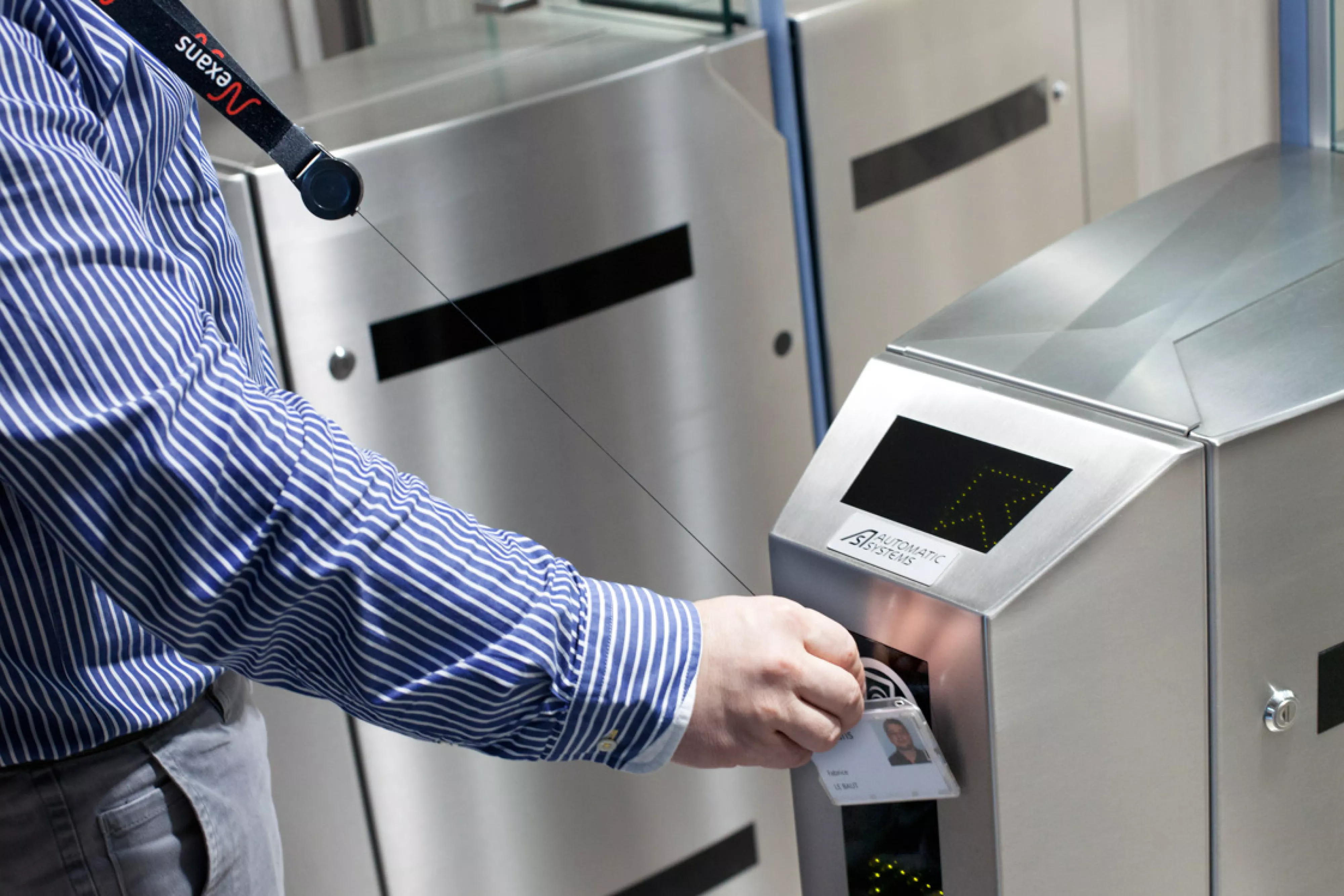 Man uses keycard to open security gate