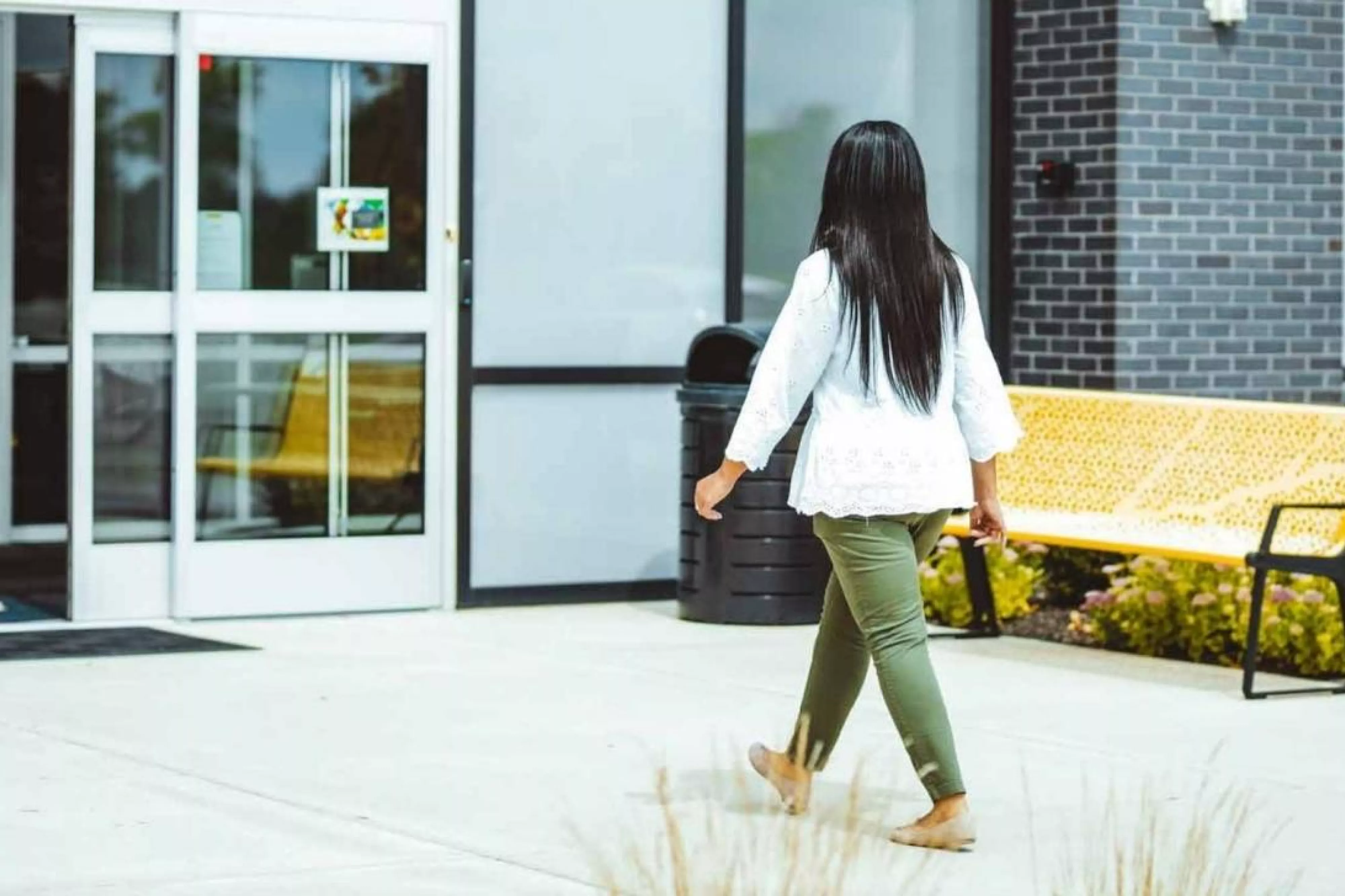 Woman entering through door access control system