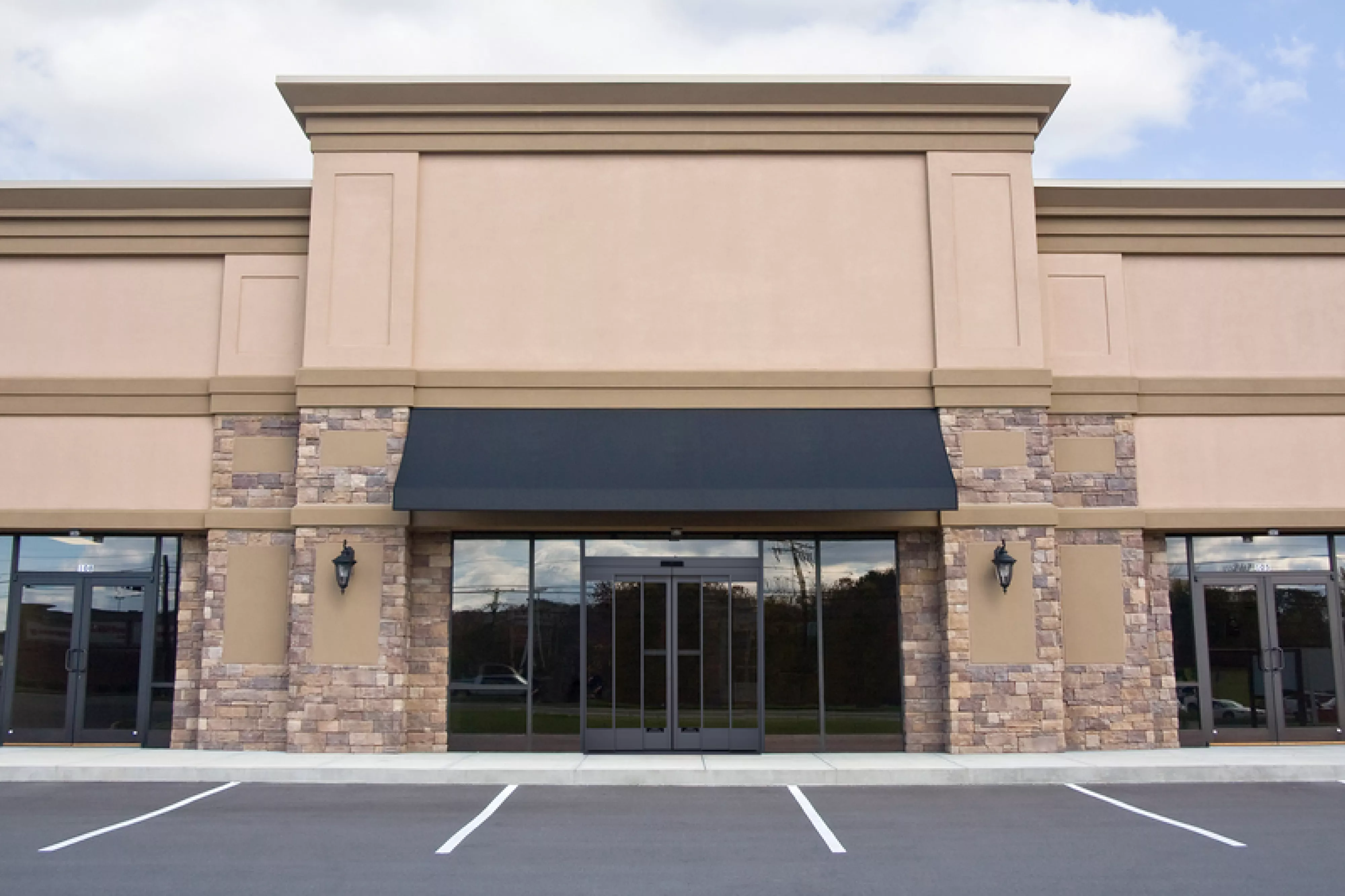 Front view of newly constructed retail storefront.