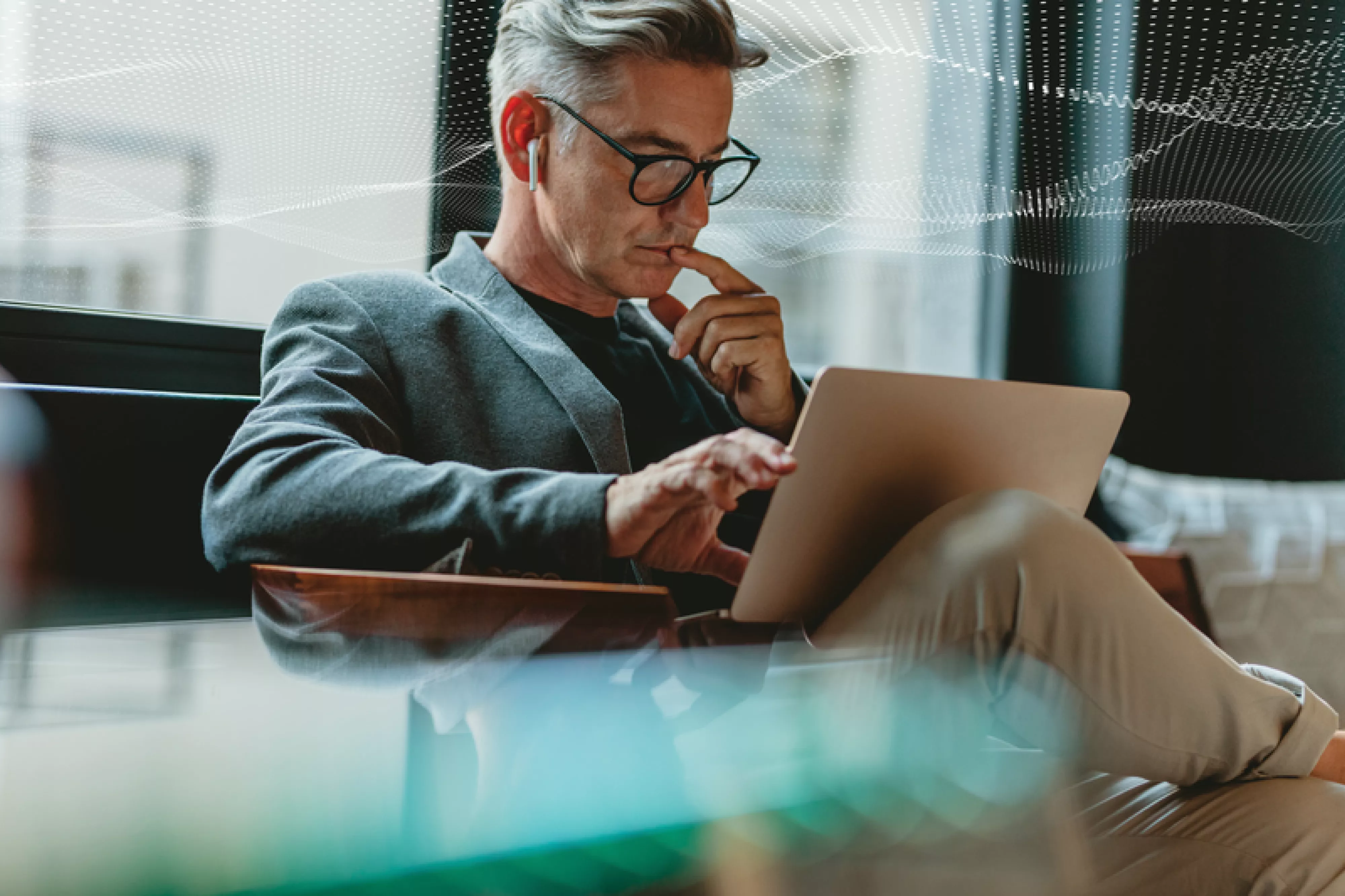 SecTech_2022_ManOnLaptop_AdobeStock_336028070_Dot