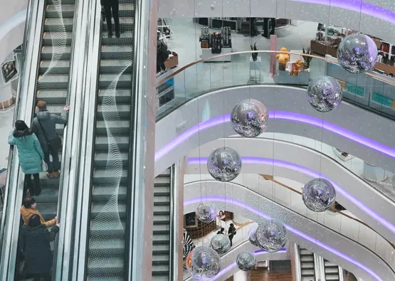 mall interior with multiple levels, escalators, and a secure shopping environment supported by advanced retail security technology