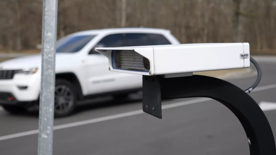 License plate recognition camera mounted on roadside.