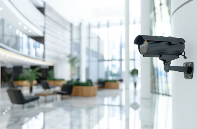 business security camera system monitoring office building interior 