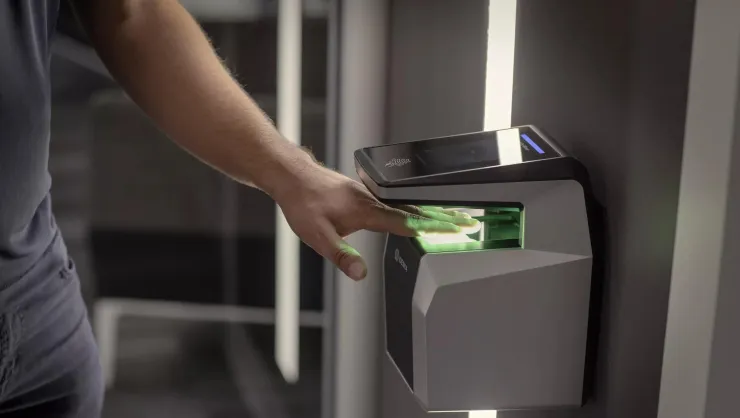 Hand scanning a biometric commercial access control card reader 