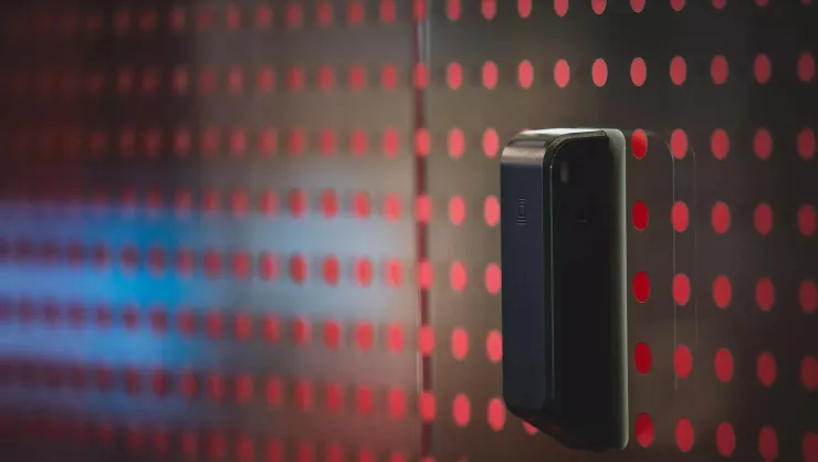 access control technology with access card reader in background and technology overlay