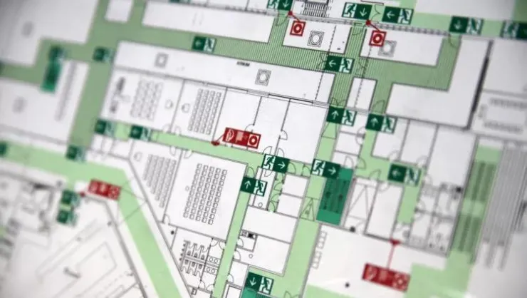 macro crop shot of evacuation plan with emergency exits