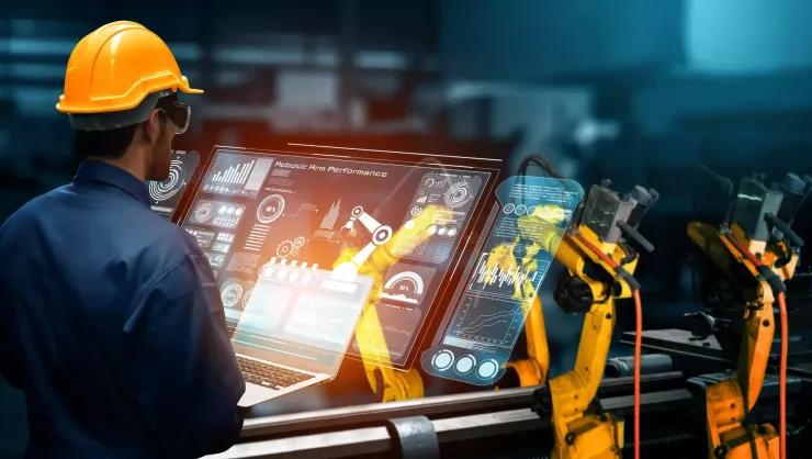 Smart industry robot arms for digital factory production technology showing automation manufacturing process of the Industry 4.0 or 4th industrial revolution and IOT software to control operation .