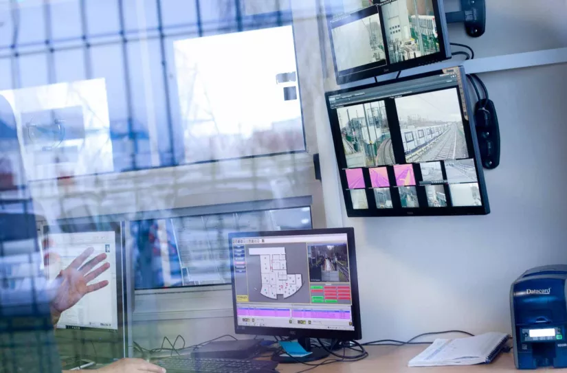 View of security monitor setup through glass