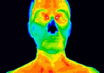 Heatmap of person's head against black background