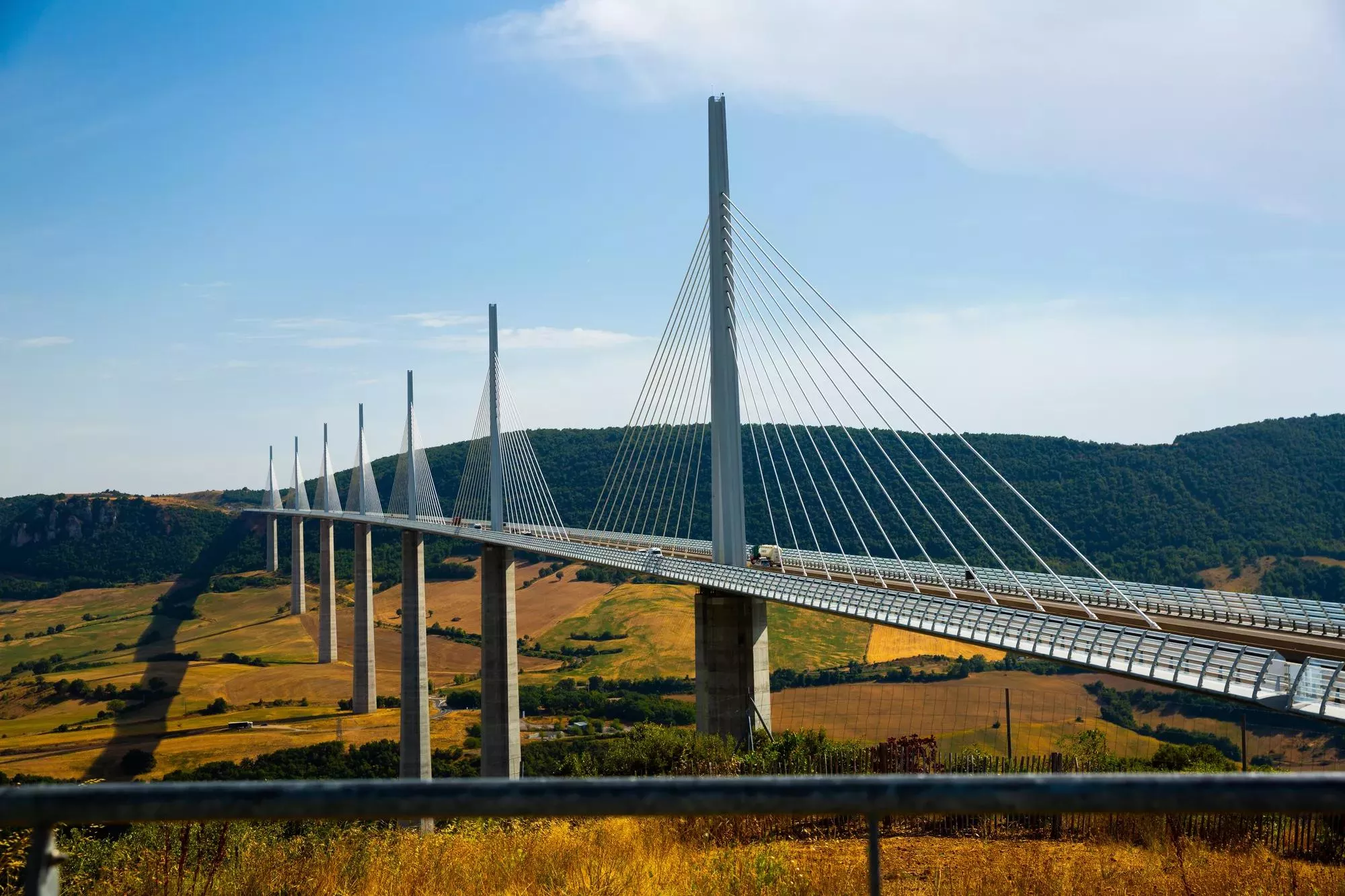Summer view of Millau Viaduct, multi-span cable-stayed bridge in France