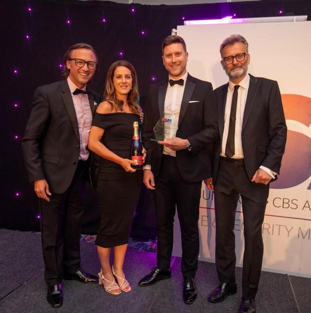 Frances Edwards and Tom Clarke accept award for 'Security Installation Company of the Year' at the 2023 FSM Awards in Coventry, UK.