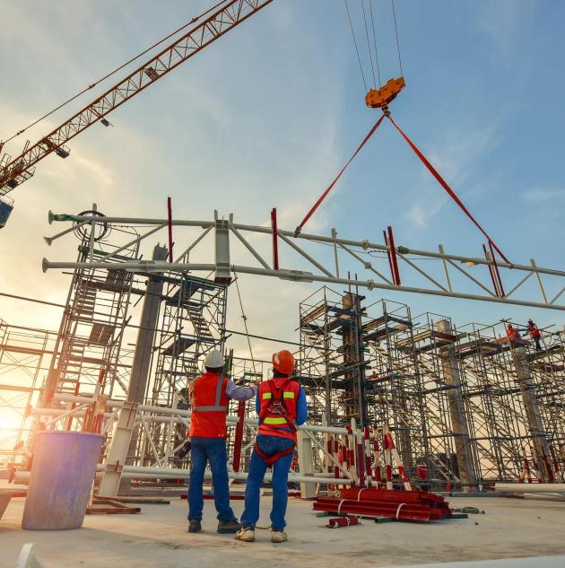 Construction worker truss installation