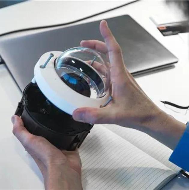 Securitas Technology employee evaluating a security product