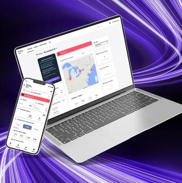 Laptop and mobile phone displaying the SecureStat HQ interface with Cumulus cloud video surveillance platform interface with live monitoring on screen.