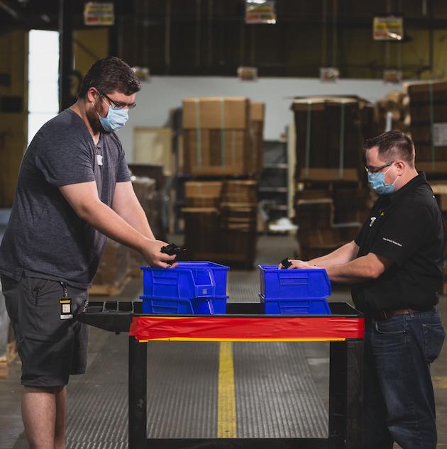 Two STANLEY employees in warehouse