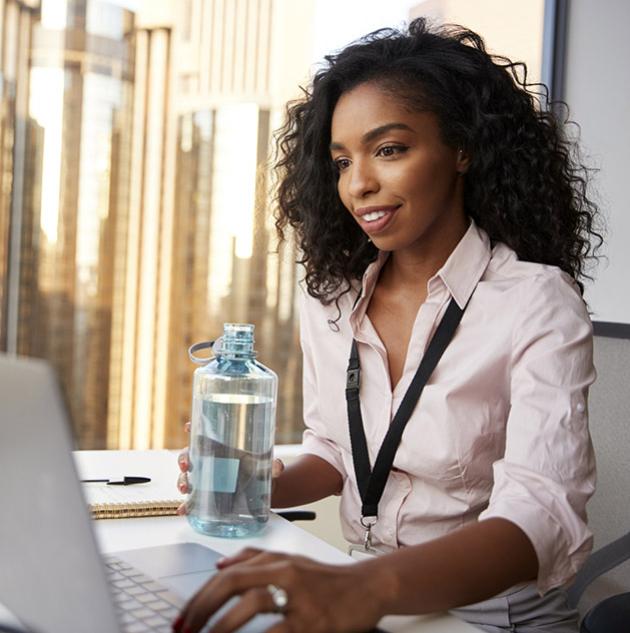 Woman by laptop