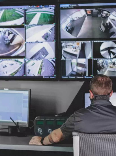 video monitoring screens at a security monitoring center 