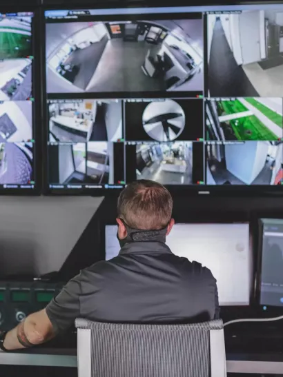 video monitoring screens at a security monitoring center 