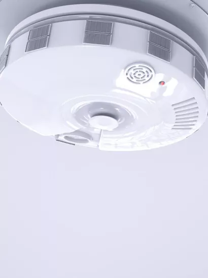 Carbon monoxide detector mounted on ceiling.