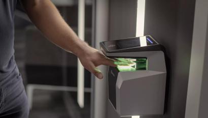 Hand scanning a biometric commercial access control card reader 