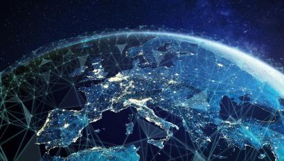 Telecommunication network above Europe viewed from space with connected system for European 5g LTE mobile web, global WiFi connection, Internet of Things (IoT) technology or blockchain fintech