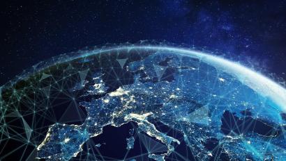 Telecommunication network above Europe viewed from space with connected system for European 5g LTE mobile web, global WiFi connection, Internet of Things (IoT) technology or blockchain fintech