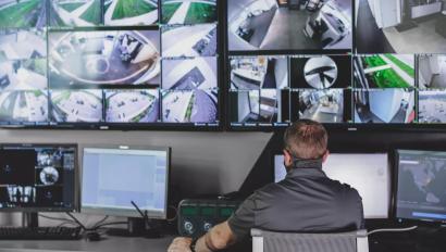 video monitoring screens at a security monitoring center 
