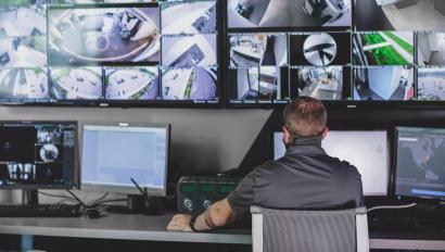video monitoring screens at a security monitoring center 