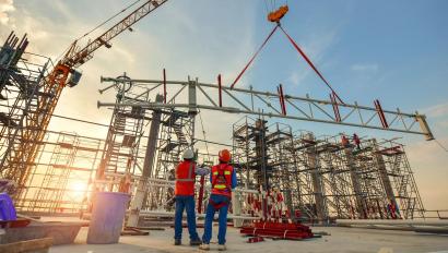 Construction worker truss installation