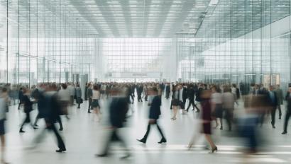people in motion, fictional place, blurred as background