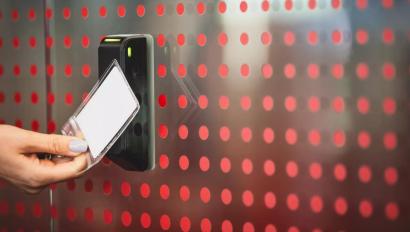 employee swiping access control card reader 