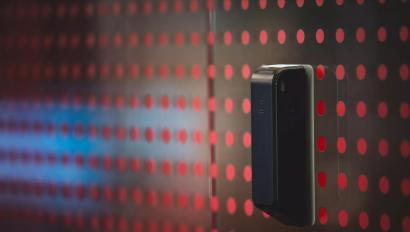 access control technology with access card reader in background and technology overlay