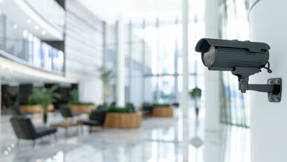 business security camera system monitoring office building interior 